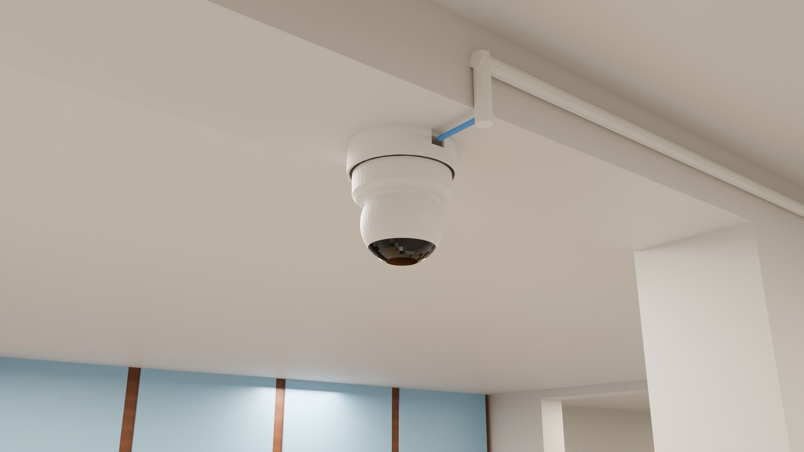 The camera on the ceiling above the serving window, with its cable duct