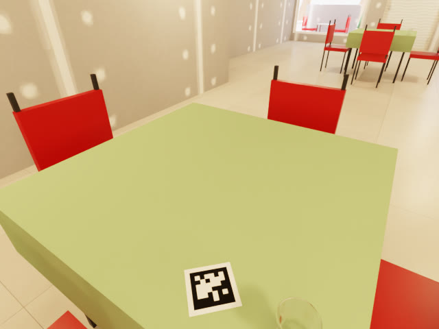 A table in the twin with its marker, from the robot's head camera