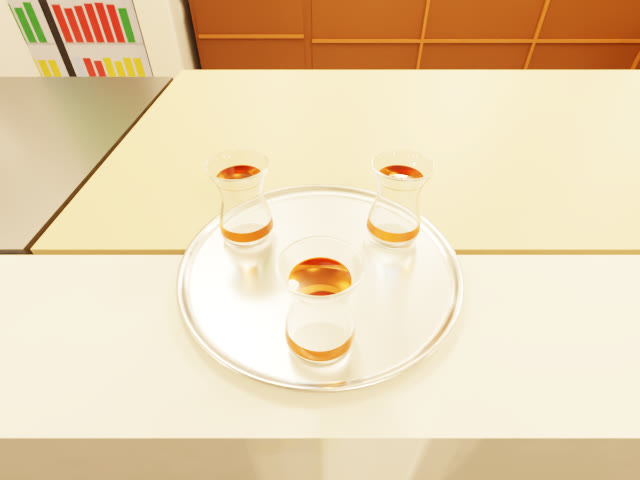 The tray with three glasses of tea in the twin